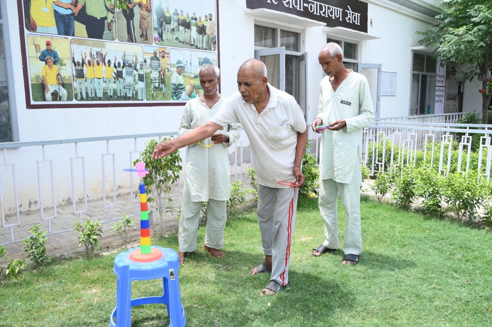 Elders playing ring toss game
